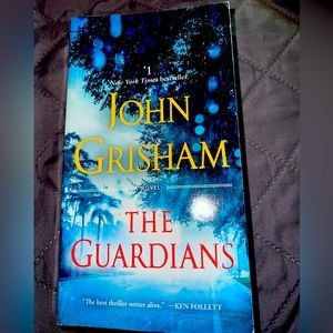 John Grisham paperback book “ The Guardians”